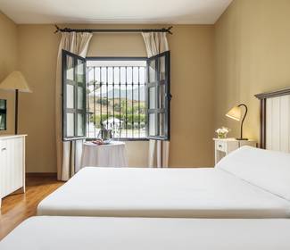 Doppelzimmer mit ausblick auf das schwimmbad Hotel ILUNION Hacienda de Mijas Doppelzimmer mit ausblick auf das schwimmbad Hotel ILUNION Hacienda de Mijas